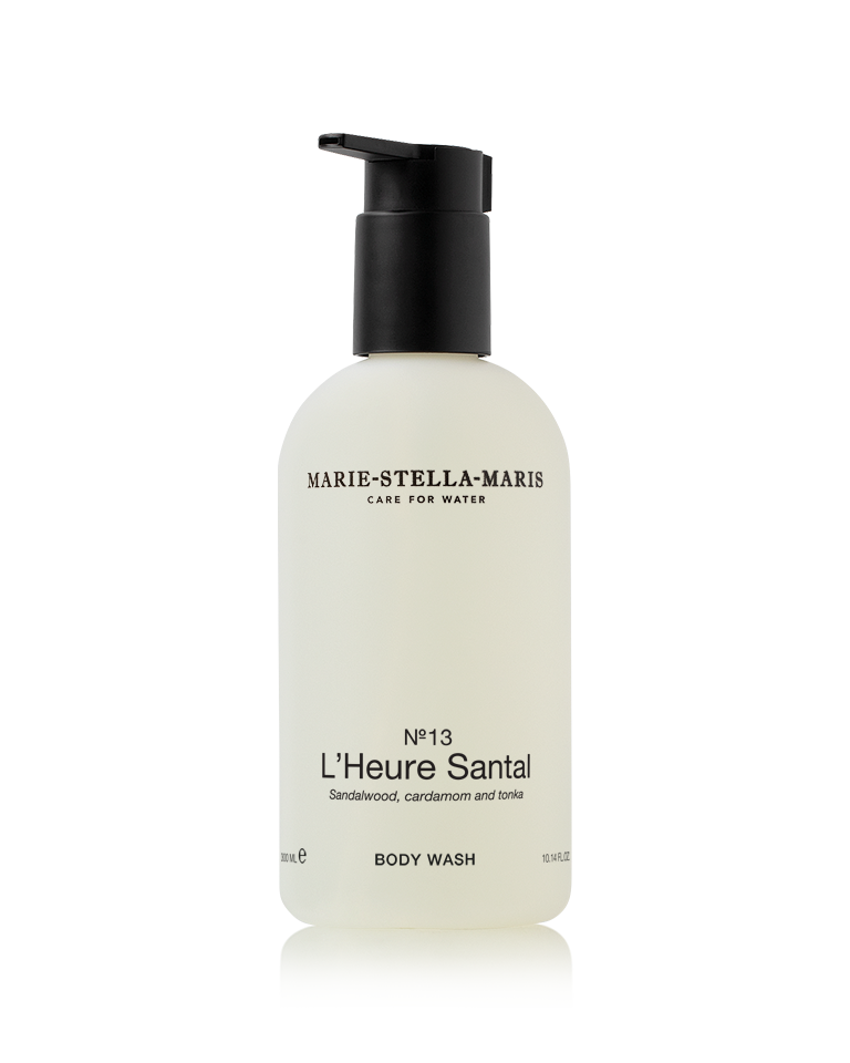Marie-Stella-Maris Body Wash in No.13 L’Heure Santal, presented in a frosted bottle with a black pump. The signature fragrance features notes of sandalwood, cardamom and tonka, photographed against a clean white background.