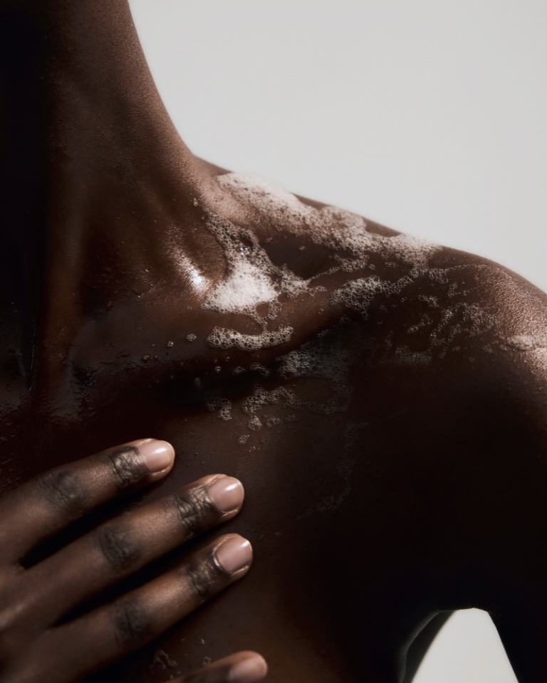 Marie-Stella-Maris Body Wash No.07 Voyage Vétiver creating a soft lather on skin, captured in a close-up self-care moment with a warm and minimal aesthetic.