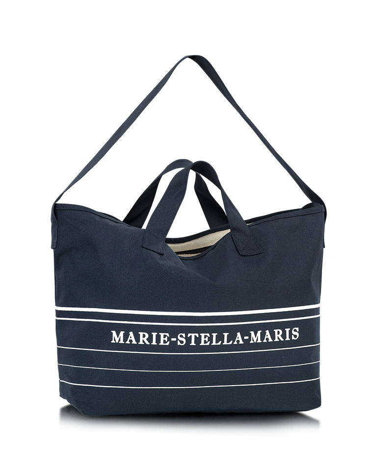 Marie-Stella-Maris limited edition summer 2026 navy blue tote bag with white stripe detailing and logo, featuring short handles and a long shoulder strap, shown as a clean product packshot against a neutral background.