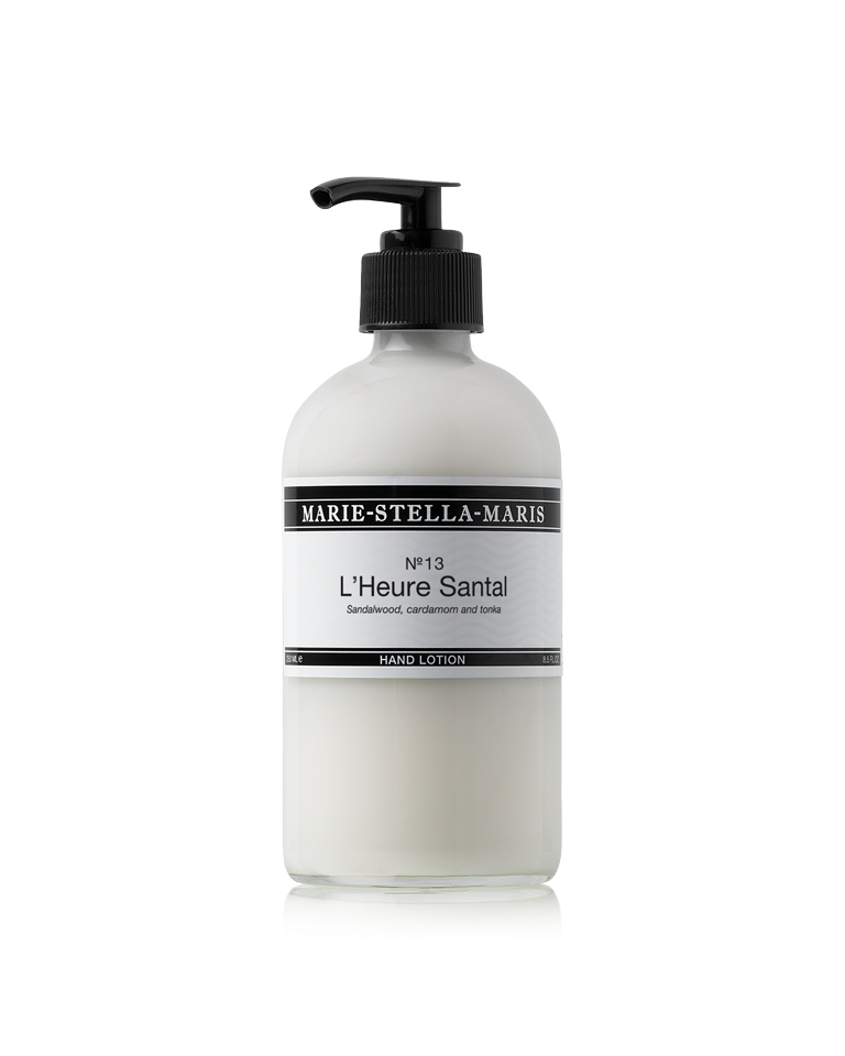 Marie-Stella-Maris No.13 L'Heure Santal Hand Lotion (250 ml) in a white pump bottle with a black dispenser. The label features the No.13 L'Heure Santal fragrance with notes of sandalwood, cardamom and tonka in the brand's signature minimalist design.