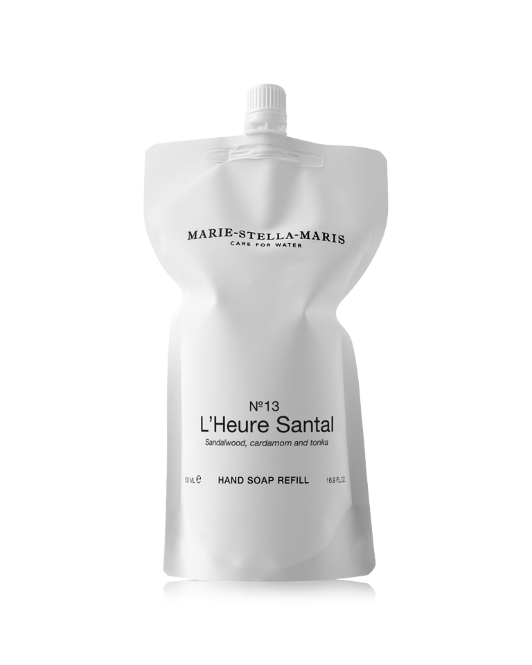 Marie-Stella-Maris Hand Soap Refill in No.13 L’Heure Santal, presented in a white refill pouch with a screw cap. The signature fragrance features notes of sandalwood, cardamom and tonka, photographed against a clean white background.