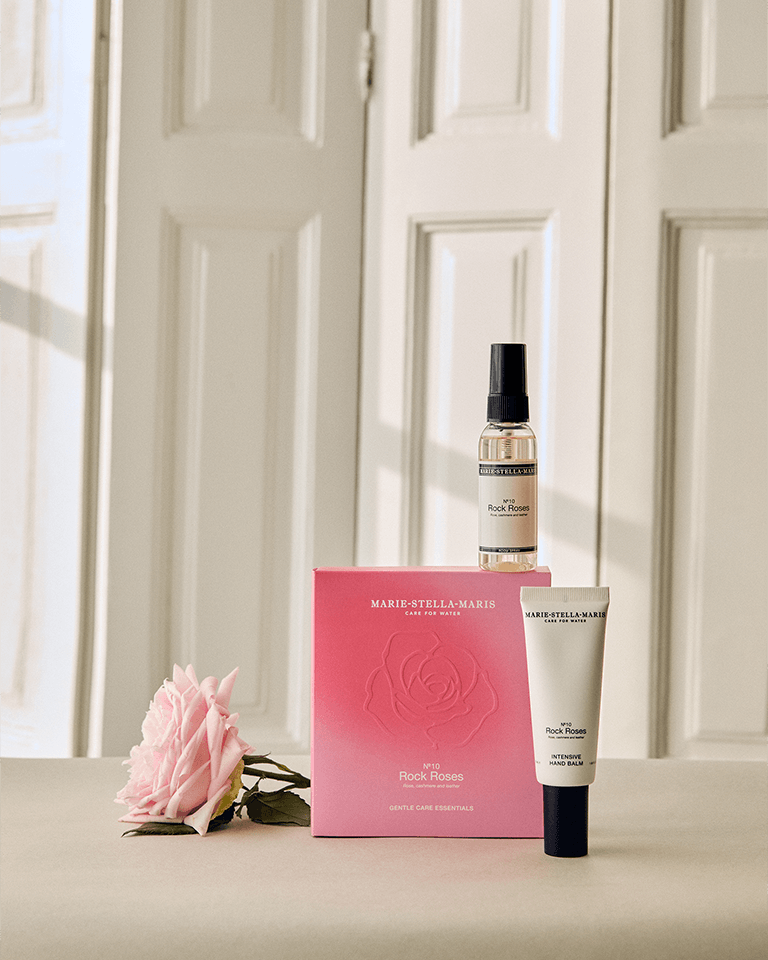 Marie-Stella-Maris No.10 Rock Roses limited edition Mother’s Day gift set, Gentle Care Essentials, including an intensive hand balm and room spray, presented with a pink branded box in a clean product packshot.