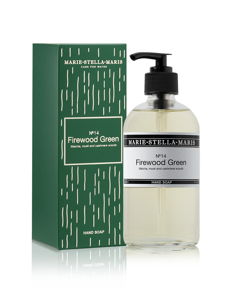 Marie-Stella-Maris No. 14 Firewood Green 250 ml hand soap with a black pump, presented beside its festive dark green and gold gift box.